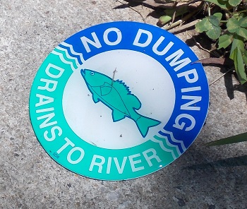 'Dump No Waste - Drains to River' is a nationwide program to help keep pollution from entering waterways via storm drains. 